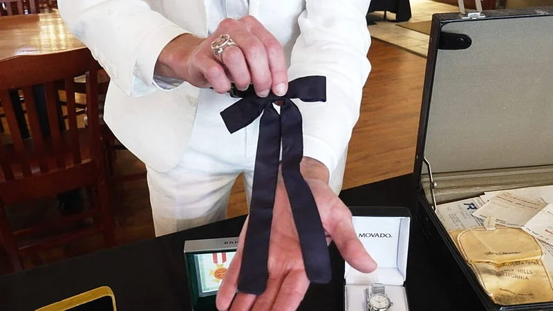 KFC founder’s famous bow tie and other finger lickin’ goodies up for auction