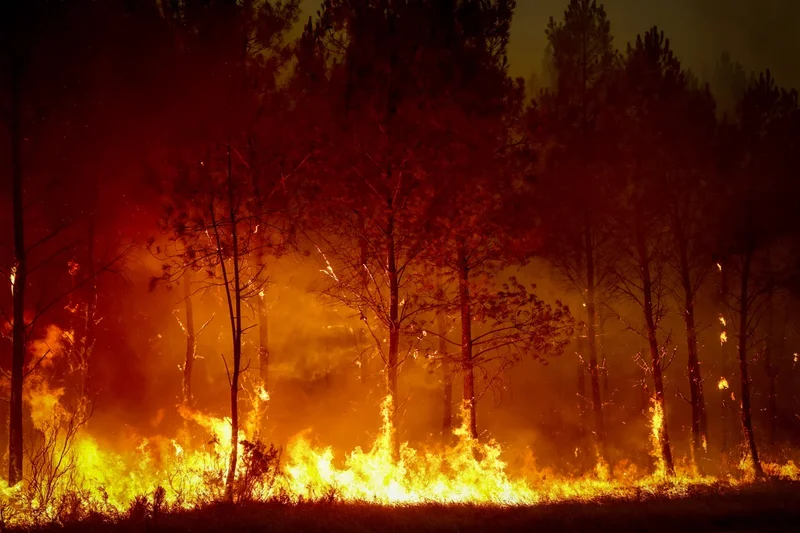Huge wildfires rage in France and Spain as firefighters race against time before next 40C heatwave