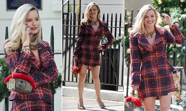 Georgia May thinks Christmas has come early! Mick Jagger's tartan-clad daughter films festive advert in July with Vinnie Jones