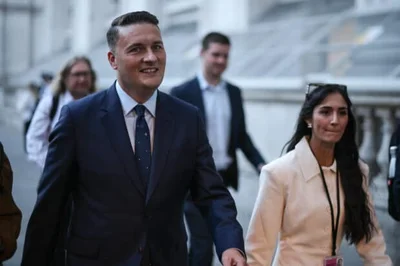 New UK PM Burnham stamps authority with cabinet shakeup