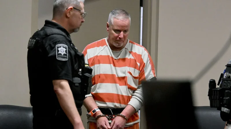 US dad who gave gun to high school shooter gets 15 years in prison