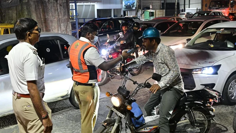 Two traffic police personnel caught on camera taking bribes in Bengaluru