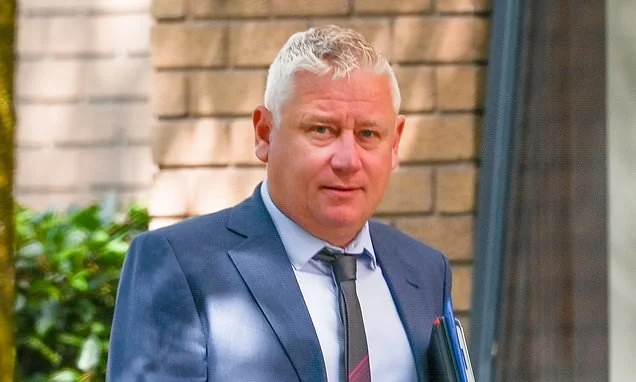 Senior detective kissed married colleague in unmarked police car they used for secret stake-outs