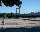 ‘Without us, they are doomed’: volunteers save fish from French rivers drying up in heatwaves