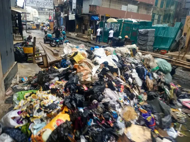 PHOTO STORY: Lagos streets, bus stops become refuse dumps as collection system falters