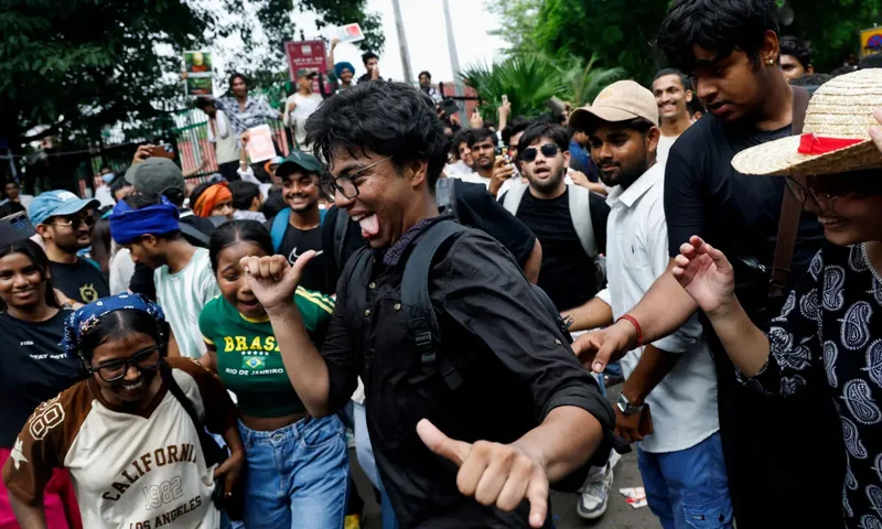 In pictures: 'Cockroach' movement protesters erupt in joy after education minister resigns