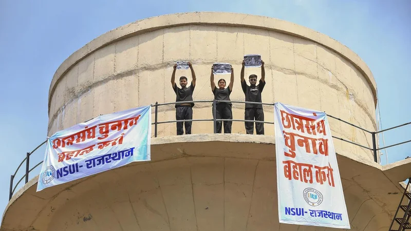 NSUI workers go on hunger strike atop water tank in Jaipur for student union elections