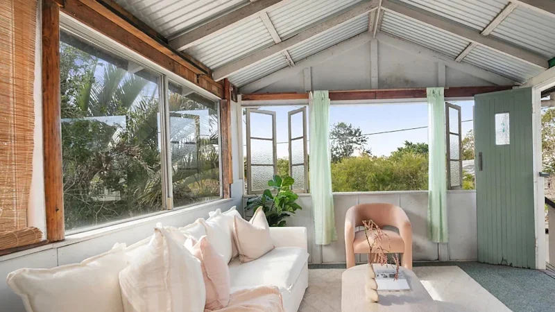 Builder bidding from boat in Vietnam, beer in hand, wins Coorparoo auction