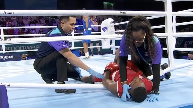 Watch: Terrifying one-punch knockout at CWG leaves boxer hanging through ropes
