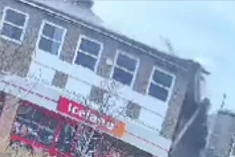 Masonry rains down on busy high street as roof above Iceland supermarket collapses