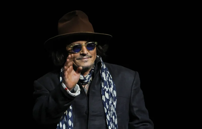 Bah, humbug: Johnny Depp wipes his grid for Ebenezer