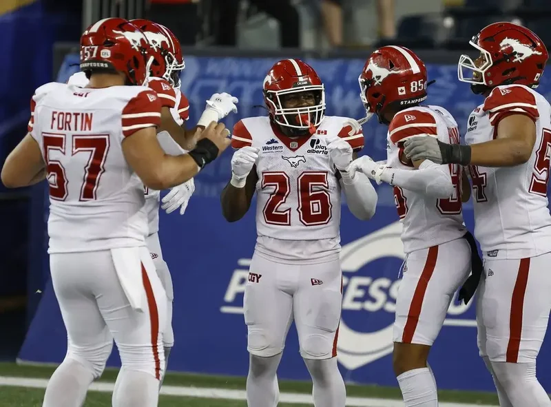 Stampeders stomp on Blue Bombers 52-30
