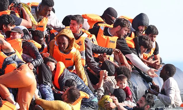 Four migrants die trying to cross the Channel by small boat just hours after estimated 700 reach Britain