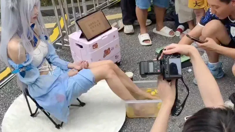 ‘So absurd!’: Chinese cosplayer draws crowds by selling lemonade ‘feet juice’