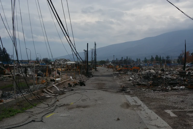 Wooden utility poles stand between wildfires and blackouts for remote communities