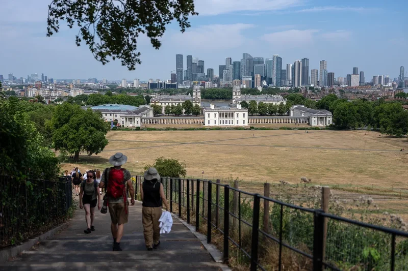 UK heatwave live: Wildfire fears grow and heat health alerts issued as fourth heatwave of summer to start
