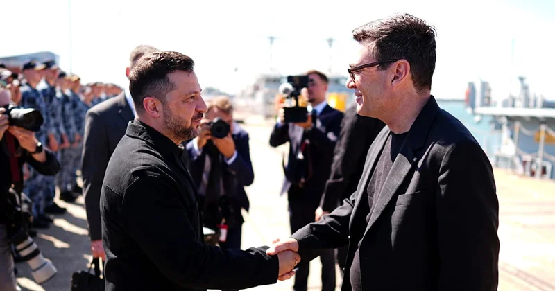 Burnham hugs Zelenskyy close in first test on world stage