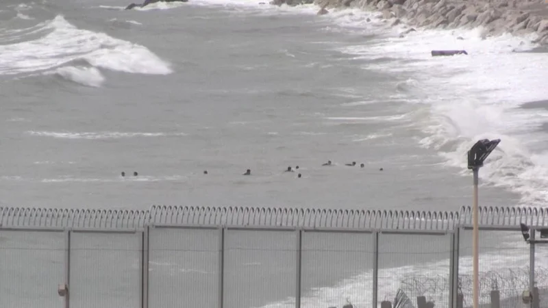 Hundreds of migrants enter Spain's north African territory Ceuta from Morocco