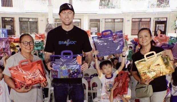 Mandaluyong pupils get school supplies; sponsor eyes K-12 scholarships