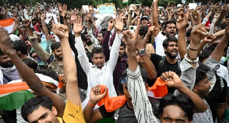 Indian youths celebrate Minister’s exit, demand more reforms