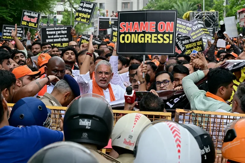 Police officer suspended in India for firing AK-47 at student ‘cockroach’ protestors