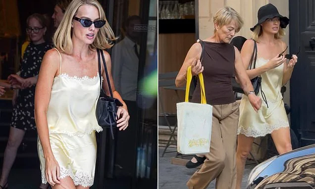Margot Robbie looks chic in a yellow silk co-ord as she joins her mother Sarie Kessler on a girls' trip to Paris
