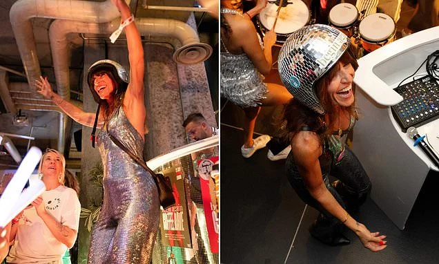 Davina McCall wears silver plunging unitard and disco ball helmet as she goes wild at rave after reports she married her husband a second time at £3.4million Kent home