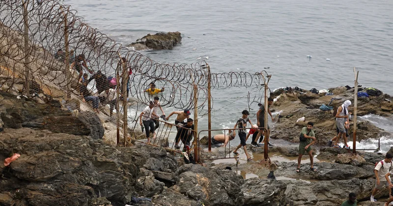 Spain’s Leader Rushes to Ceuta After Thousands of Migrants Burst Across Border