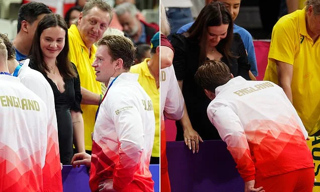 Adam Peaty kisses pregnant wife Holly Ramsay's baby bump as he celebrates winning a silver medal for the 4x100m relay at the Commonwealth Games