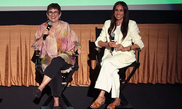 Meghan reveals advice Harry gave her about weathering 'hard days' as she makes first appearance since her UK visit at screening for Girl Scouts movie