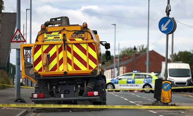 Pedestrian, 64, dies 'after being hit by a road sweeper' in Salford
