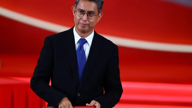 Woman rejects links to Singapore ex-minister Faishal’s resignation