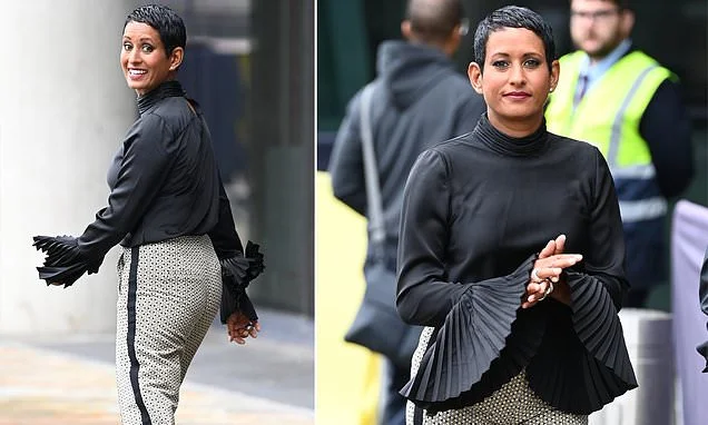 Naga Munchetty smiles as she's seen for the first time since she announced that she was leaving BBC Breakfast and taking Radio 5 Live job after 'bullying probe was quietly dropped'
