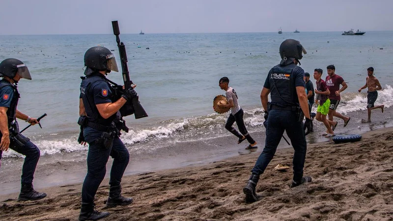 Spain deploys military to Ceuta after thousands of people breach Morocco's border, at least nine die