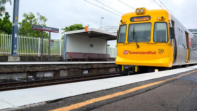 Car strikes train bridge, suspending line for over an hour