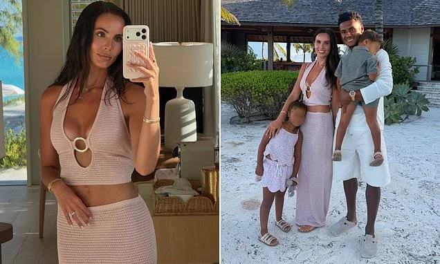 WAG Ellie Watkins stuns in plunging pink halter neck top as she enjoys family holiday with her husband Ollie and children