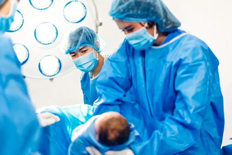 Court reduces sentences in newborn killing case, acquits mother