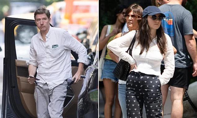 Married NYC lawyer, 45, is SUSPENDED from his job after he was caught smooching with underling, 29, in Central Park