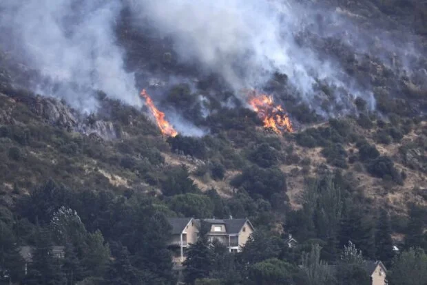 Wildfires force 267,000 to flee across France, Spain