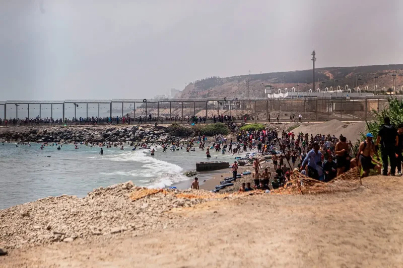 Thousands flood into Spain’s Ceuta from Morocco, sparking military response