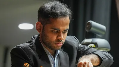 Arjun Erigaisi beats world champion Gukesh with black to jump to joint lead