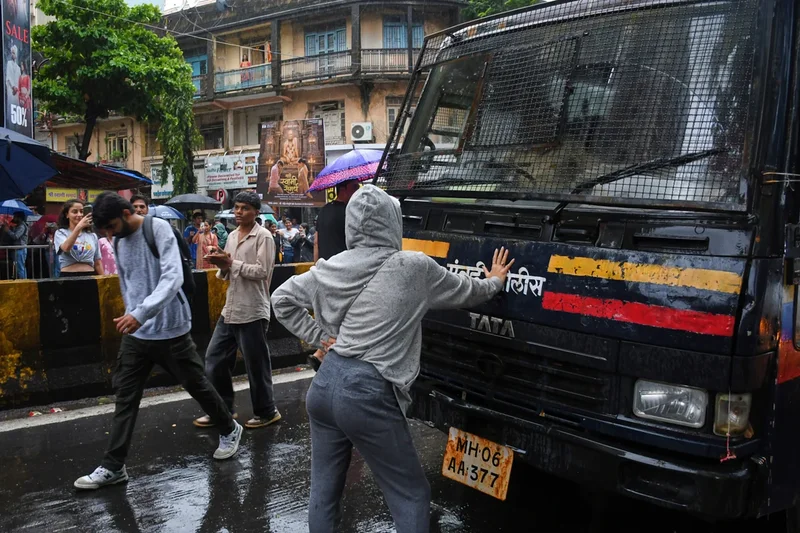 One image defines India’s ‘cockroach’ protests: a 27-year-old woman before a police van of detainees