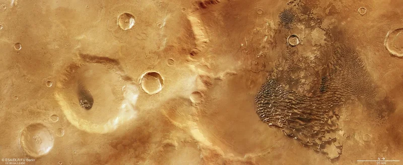 Mars Express Captures 'Metallic' Waves Rolling Across an Ancient Martian Crater