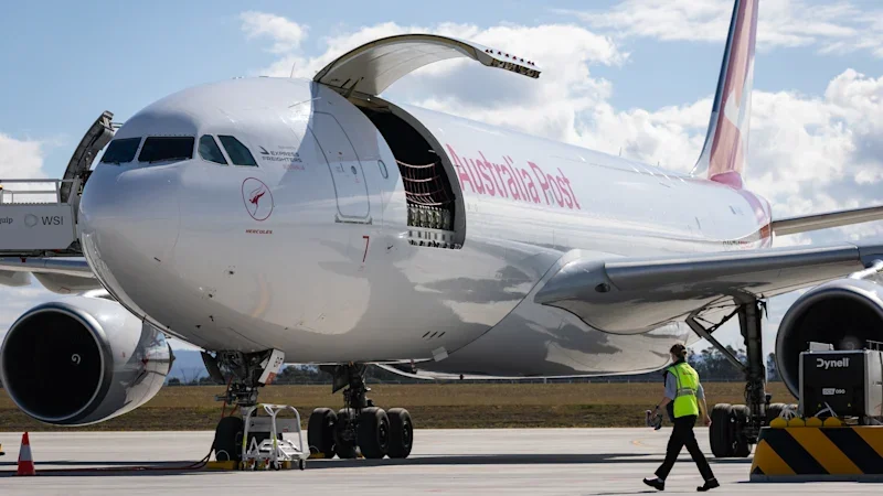 Flying into night sky, first cargo plane from Sydney’s new airport sparks parcel frenzy
