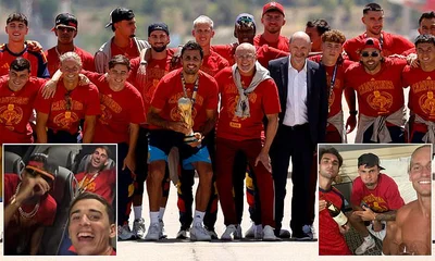 Spain's World Cup heroes touch down in Madrid after enjoying £1K bottle of red wine and cigars in their New York hotel before late-night dash to airport