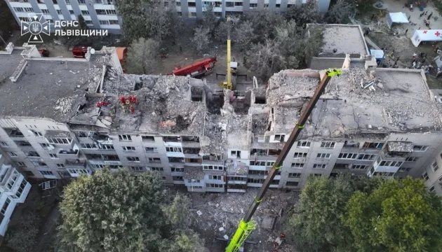 Two people may still be trapped under rubble after Russian missile strike on Lviv