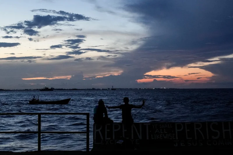 Search for 17 missing crew after Vietnamese cargo ship sinks in South China Sea