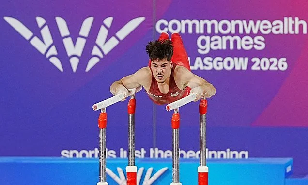 English gymnast suffers horrific head injury at Commonwealth Games as event is suspended and star is taken out of arena on a stretcher
