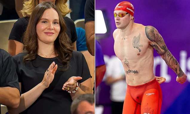 Pregnant Holly Ramsay smiles as she arrives to watch husband Adam's 100m breaststroke final at the Commonwealth Games