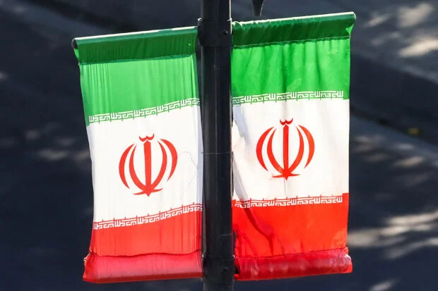 Iran hangs two anti-government protesters in public